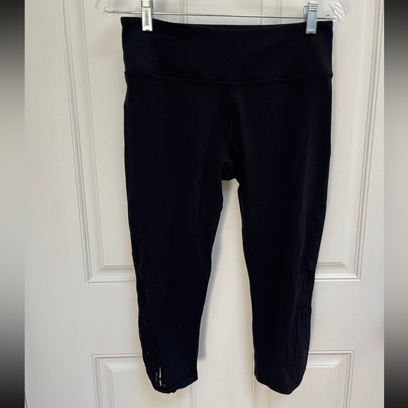 Glyder Pants - Glyder black leggings side cut out size medium